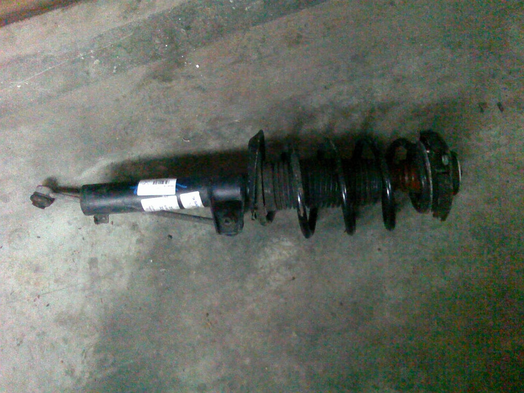 amortizor stanga fata complet Volkswagen Passat B6