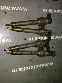 Injectoare 4 buc BMW seria 3 E91 2.0d
