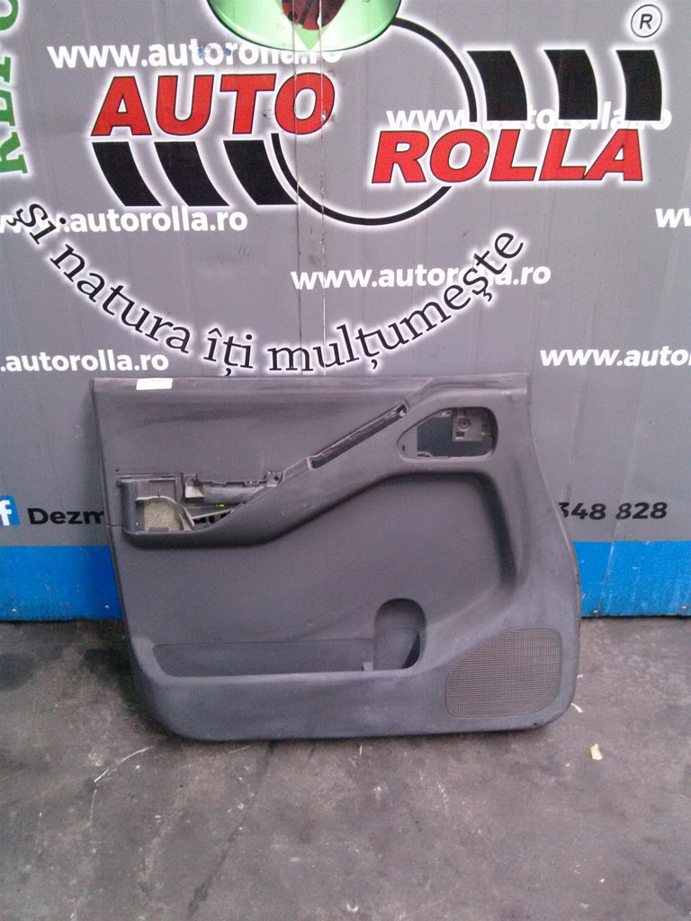 Tapiterie usa stanga fata Nissan Navara an 2005