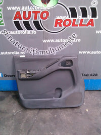 Tapiterie usa stanga fata Nissan Navara an 2005