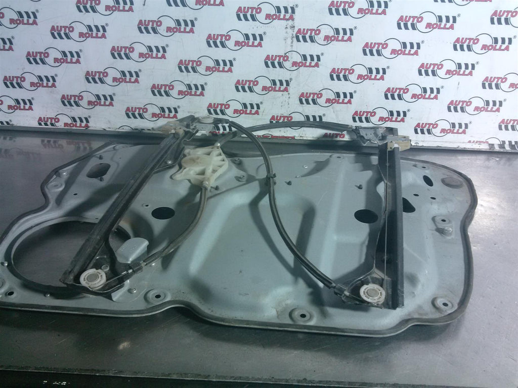 Macara+motoras stanga fata Volkswagen Caddy, an 2006