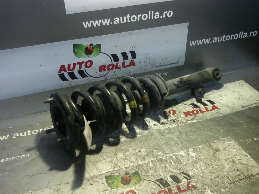 amortizor stanga fata complet Mitsubishi L200, an 2008