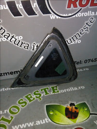 Geam coltar caroserie stanga spate Ford Fiesta, an 2010