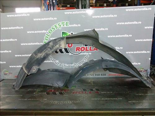 Carenaje roata stanga+dreapta fata Dacia Logan an 2005