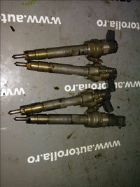 Injectoare 4 buc BMW seria 3 E91 2.0d
