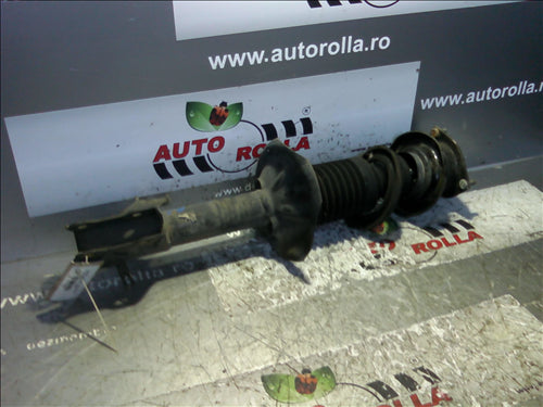 amortizor si flansa dreapta fata Nissan Almera, an 2005