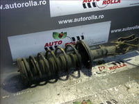 amortizor stanga spate complet Toyota Avensis, an 2000
